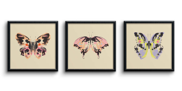 A trio of butterfly wall prints