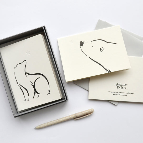 Boxed set of letterpress christmas cards featuring a bear and a star