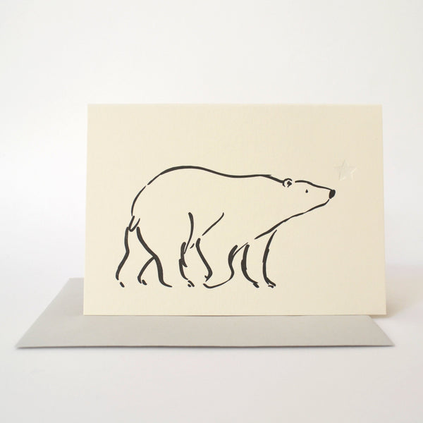 Letterpress card featuring a bear and a star