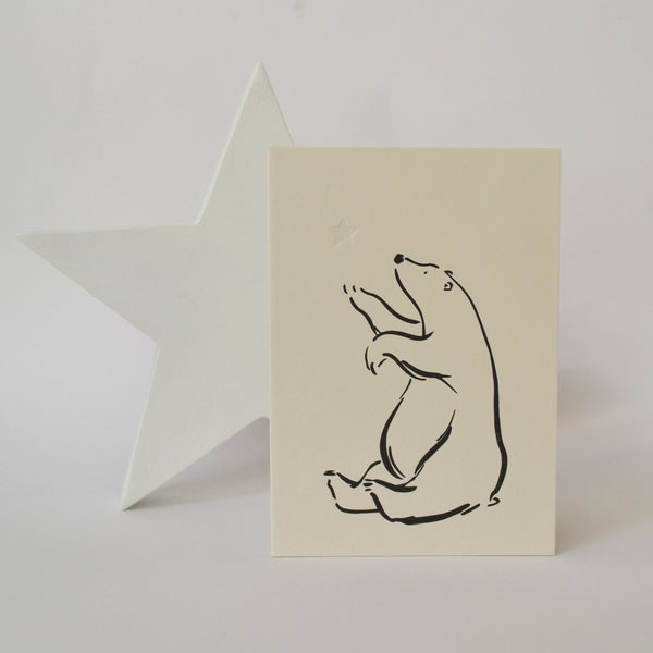 letterpress card featuring a bear and a star