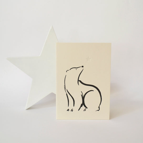 Letterpress card featuring a bear and a star
