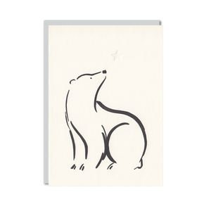 Letterpress christmas card featuring a bear and a star