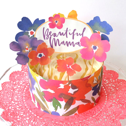 Mother's Day cake decorated in pretty floral cake toppers 